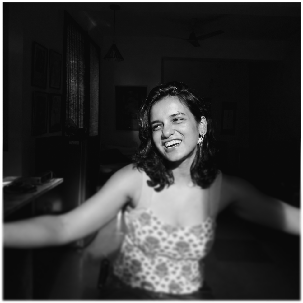 Siddhika smiling with arms outstretched